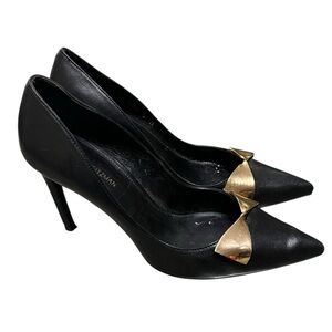Stuart Weitzman Stanton 90 black leather heels with metallic gold bow accent